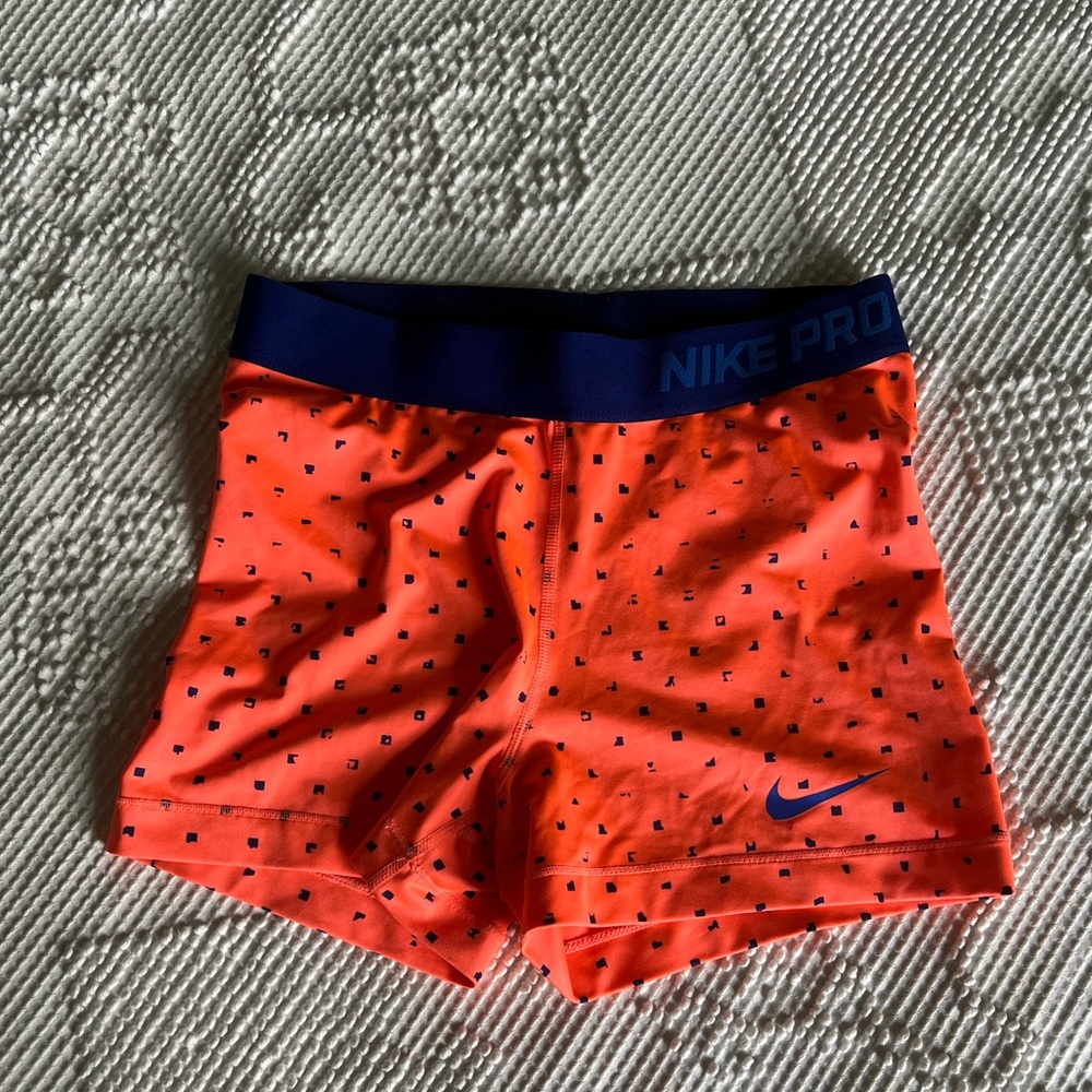 Orange and Blue Nike Pros